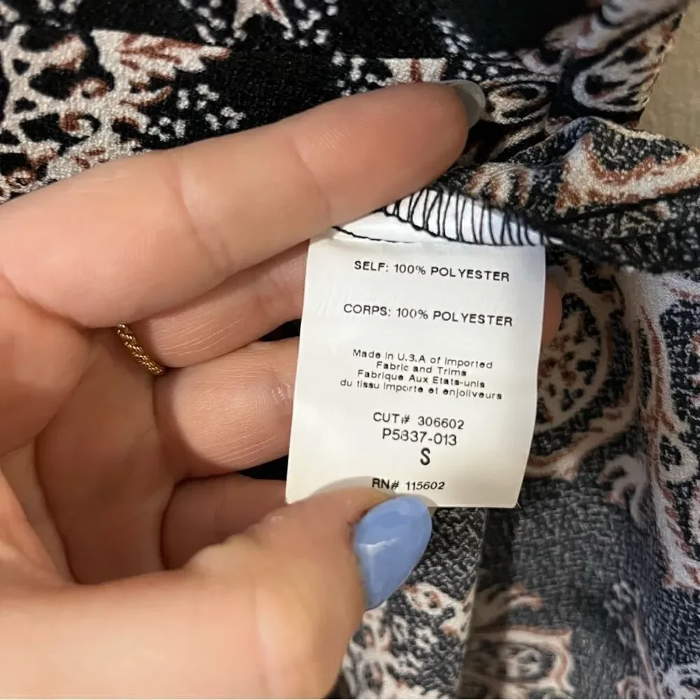 Lush  romper one piece Size small fun all over print sleeveless date